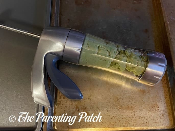 Dough in Cookie Press for Classic Spritz Cookies