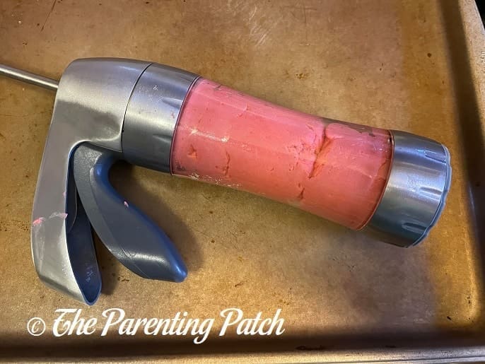 Dough in Cookie Press for Peanut Butter Spritz Cookies