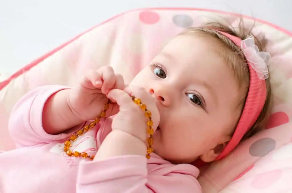 Baby with teething beads