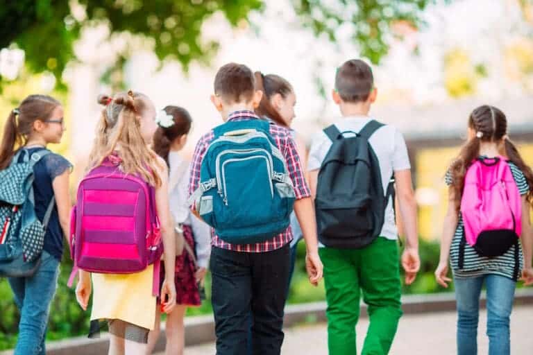 Group of kids going to school together.