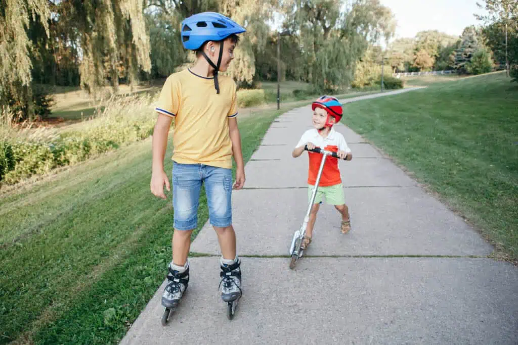 Older sibling with younger tagging along