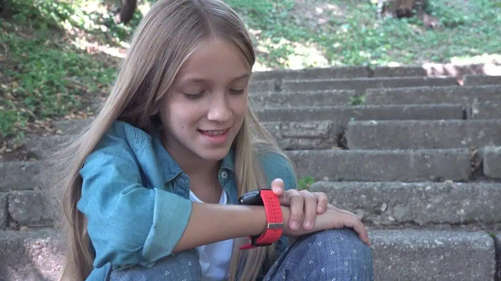 Smart Watch, Child Using Smartwatch Outdoor in Park, Kid Talking at Smartphone