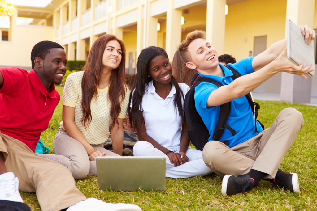 Students Taking Selfie With Digital Tablet
