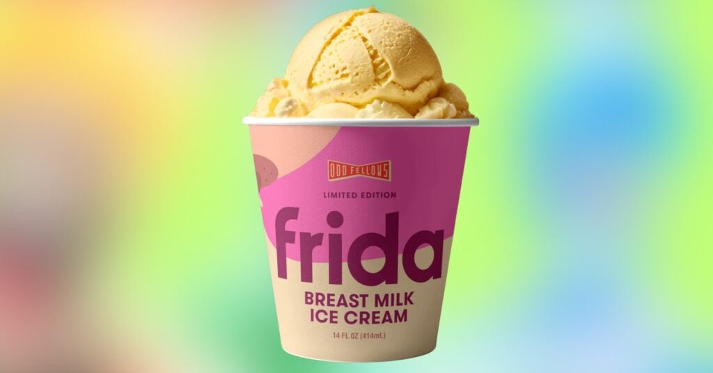 Frida's breastmilk ice cream has a yellowish tint, and is displayed in a pink and yellow carton.