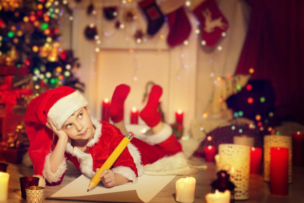 Child Writing Christmas Letter, Happy Kid Write Wish List to Santa Claus