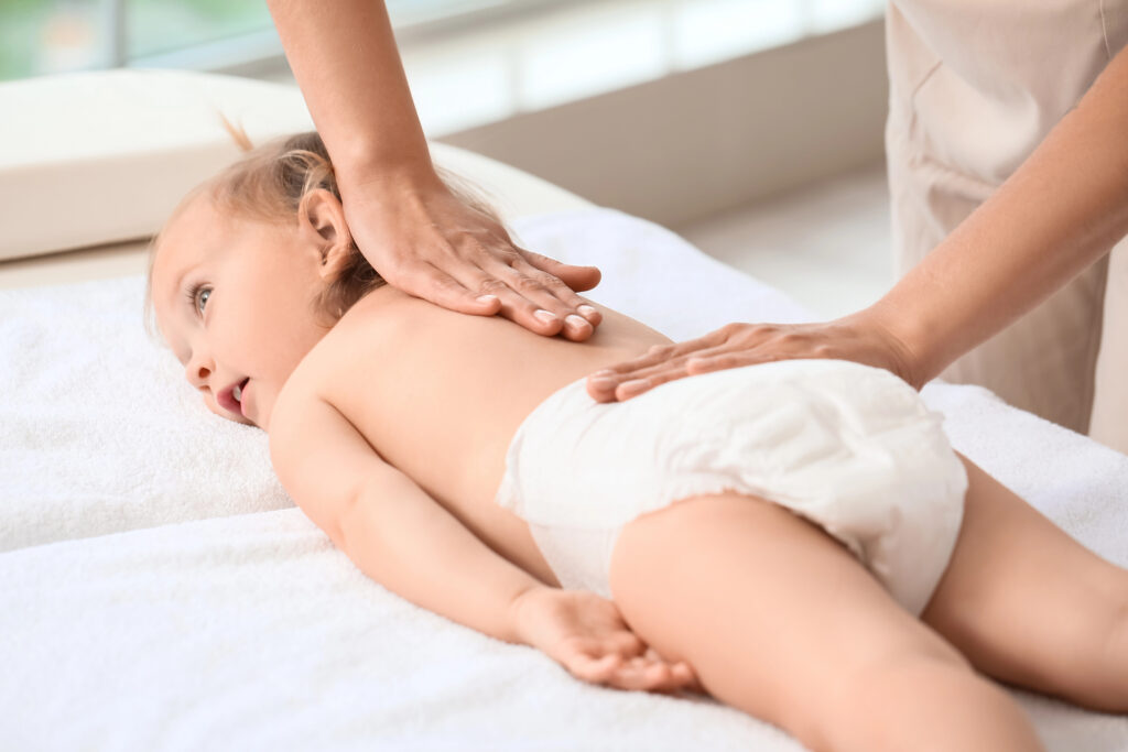 Child being treated with massage