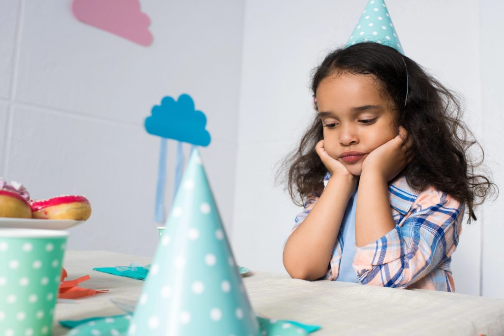 upset child at birthday party