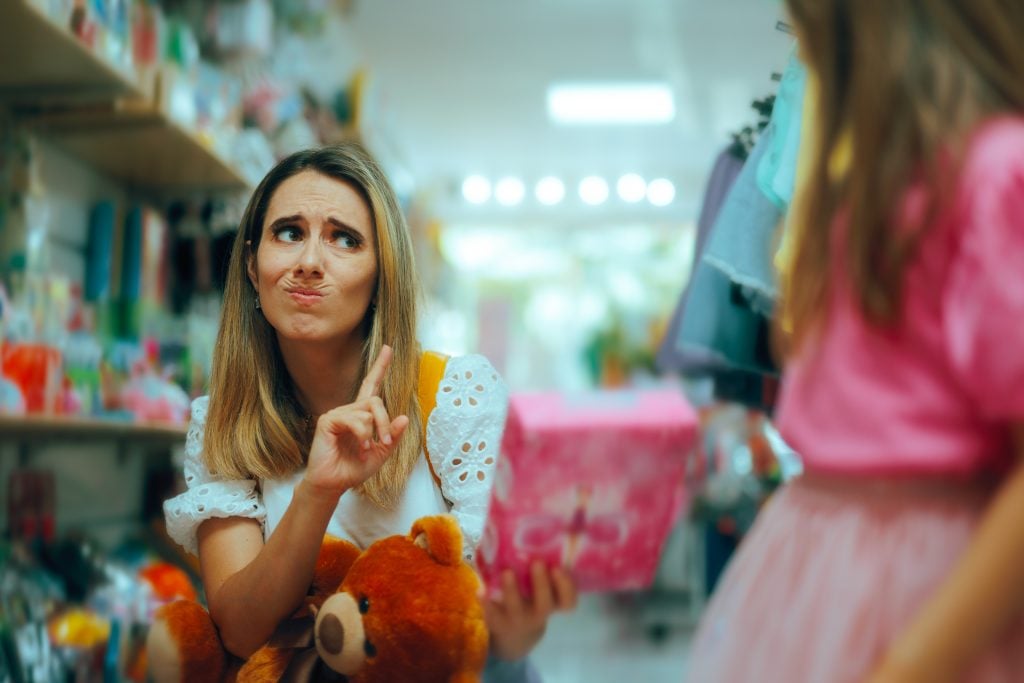 Mother Saying No to her Kid Not Buying New Toy