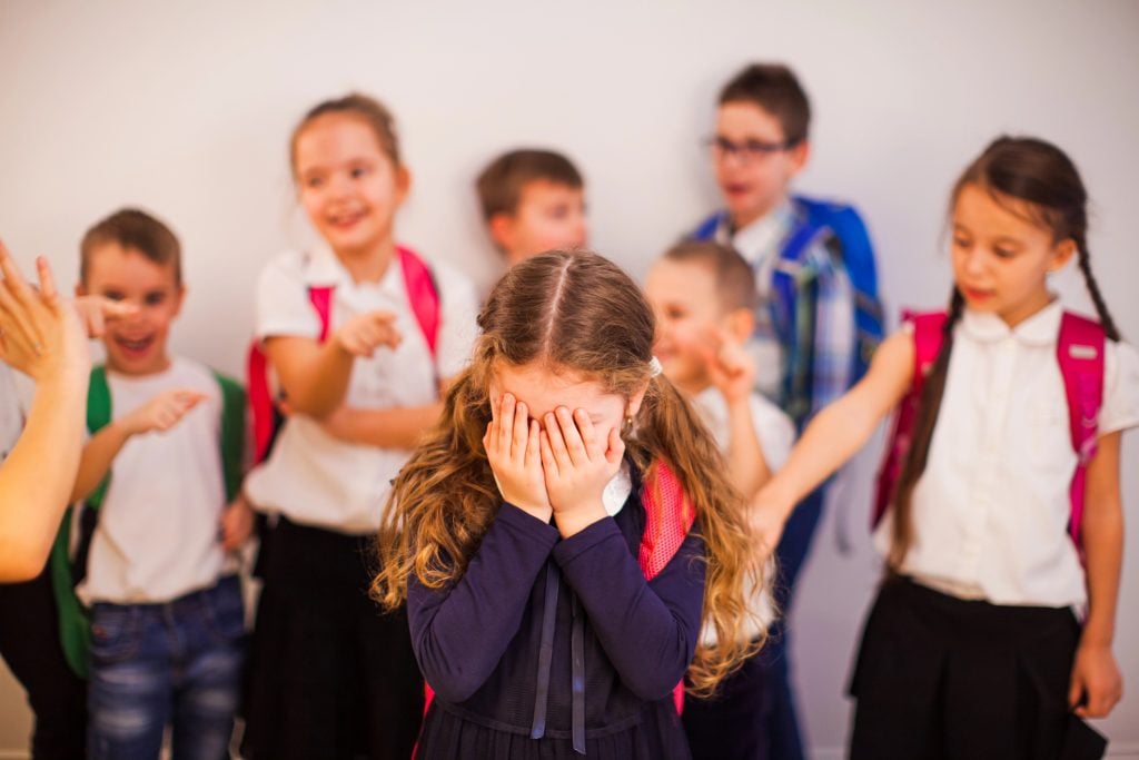 The girl suffers from bullying by peers at school