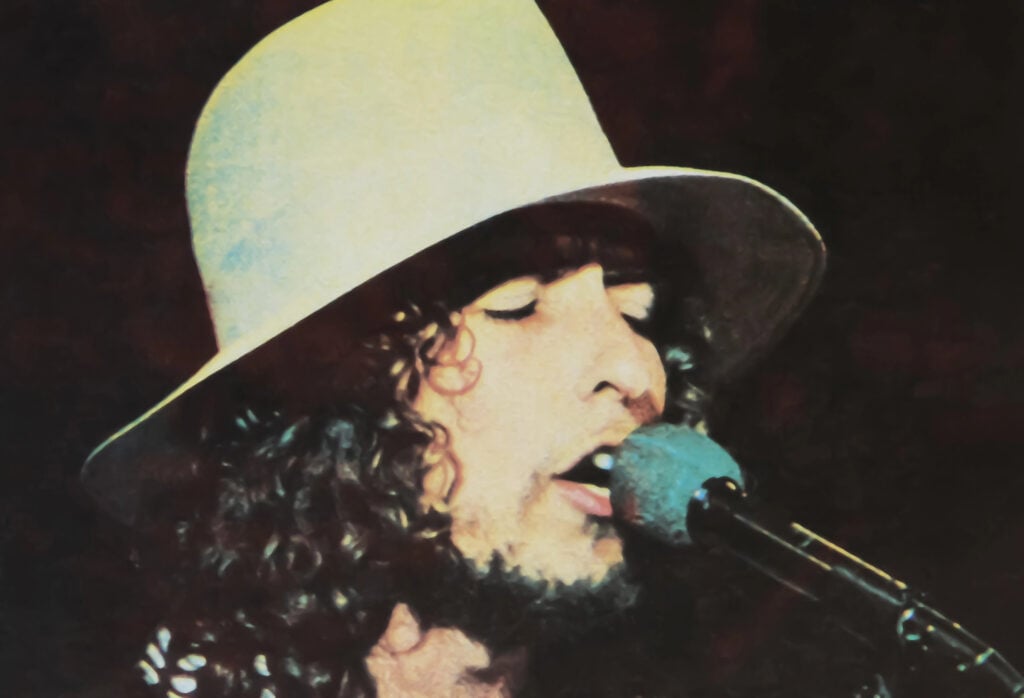 Viersen, Germany - June 3. 2024: Old magazine photo of Bob Dylan in The Last Waltz film from 1976 (focus on face)