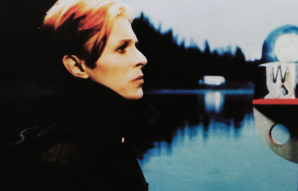 Viersen, Germany - June 2. 2024: Old magazine photo of David Bowie in The Man Who Fall To Earth from 1976 (focus on face)