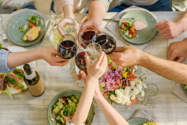 family clinking glasses