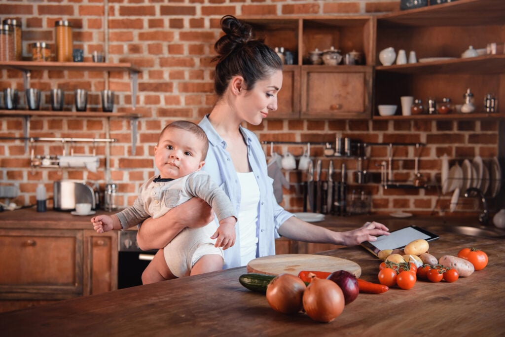 Mother with son in the kitchen