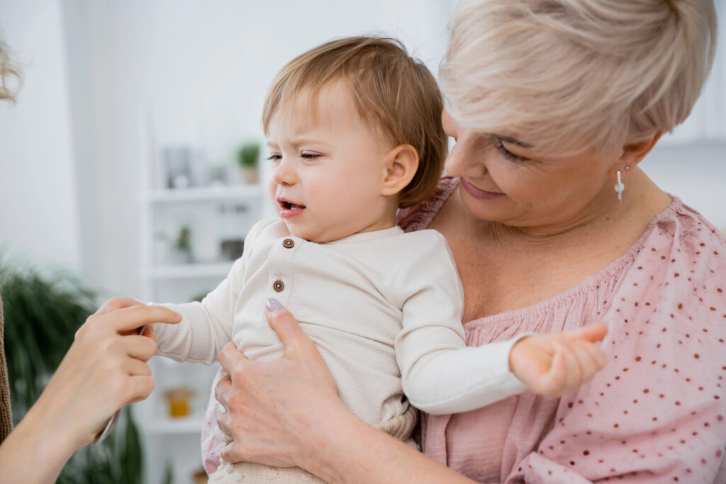 women calming a toddler