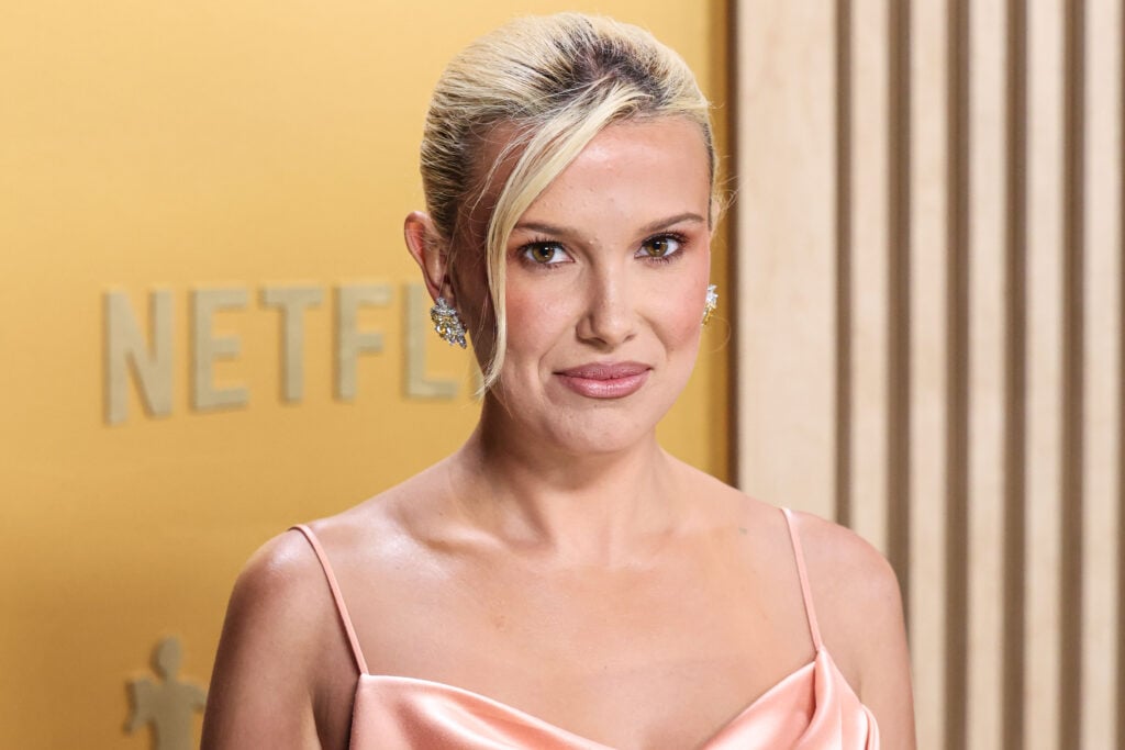 Millie Bobby Brown wearing a Louis Vuitton dress and shoes with Chopard jewelry arrives at the 31st Annual Screen Actors Guild Awards held at the Shrine Auditorium and Expo Hall on February 23, 2025 in Los Angeles, California, United States.