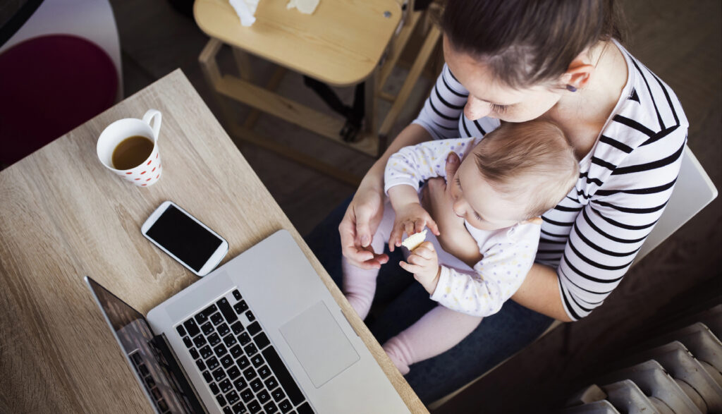 Young mother working from home