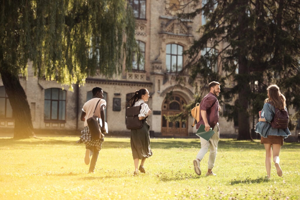 students running to university