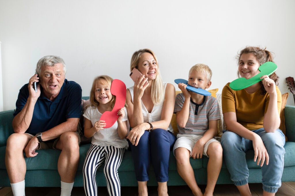 Family with large phone icons